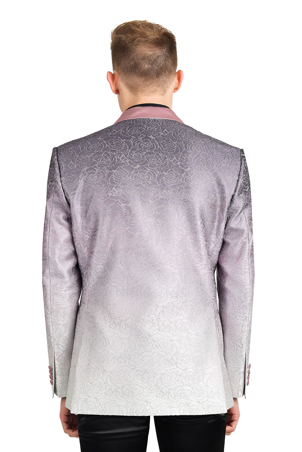 A stylish high school student wearing KCT Menswear's Dazzling Prom Blazer, showcasing its stunning two-tone blush pink fading effect, silver floral pattern, and gradient design - perfect for a memorable prom night