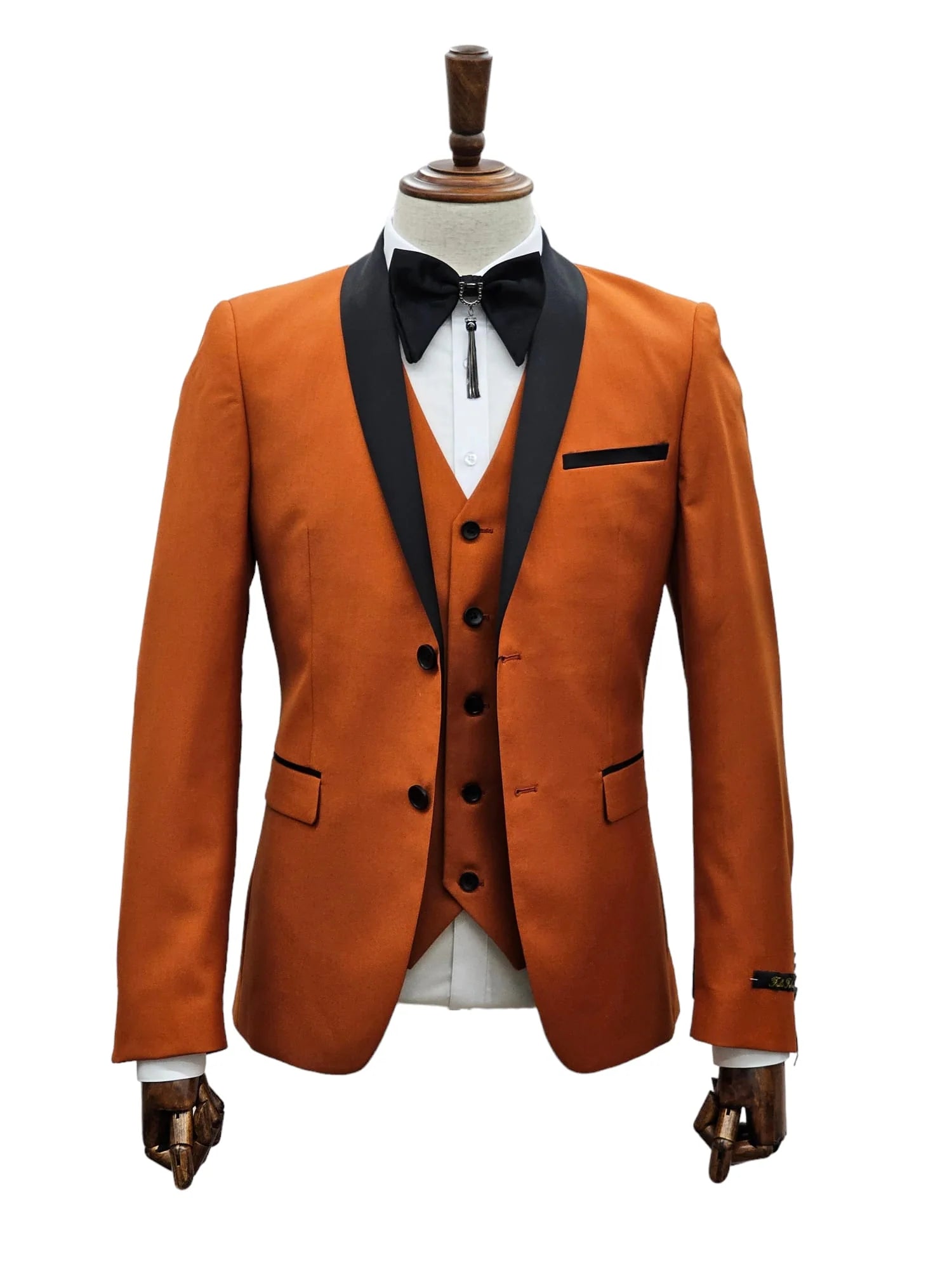 KCT Menswear's rust tuxedo jacket radiates the warmth of autumn elegance.