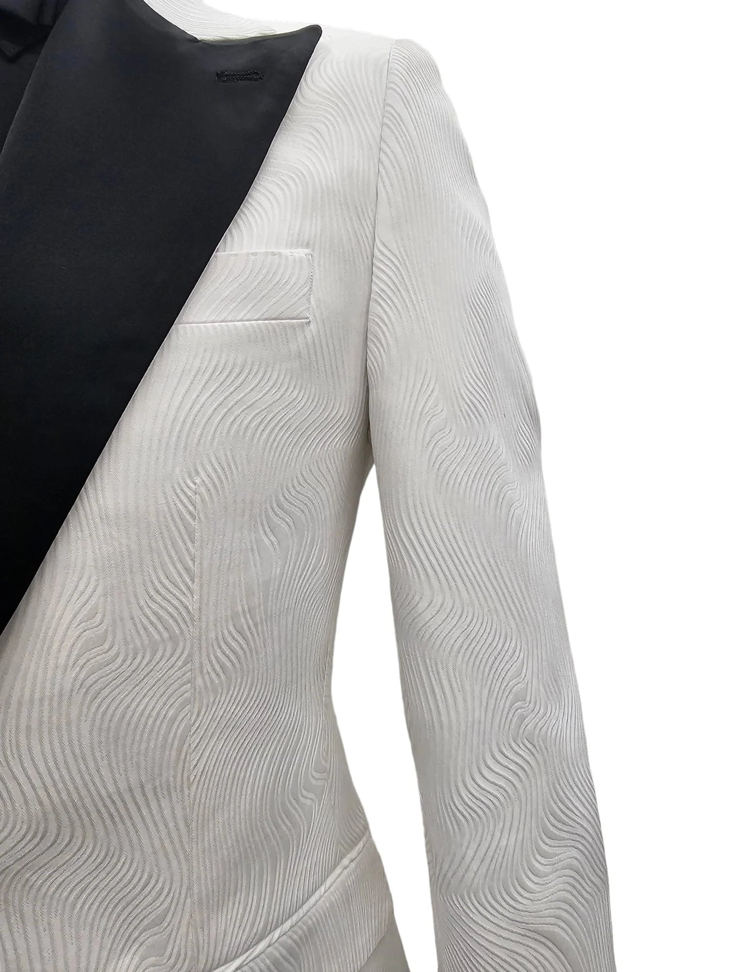 Elegant white tuxedo jacket with black trim and trousers on display."