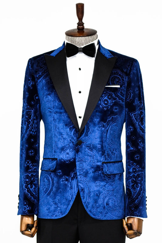 Man wearing a stylish Royal Blue Velvet Paisley Engraved Prom Blazer by KCT Menswear, showcasing elegance and sophistication in formal wear.