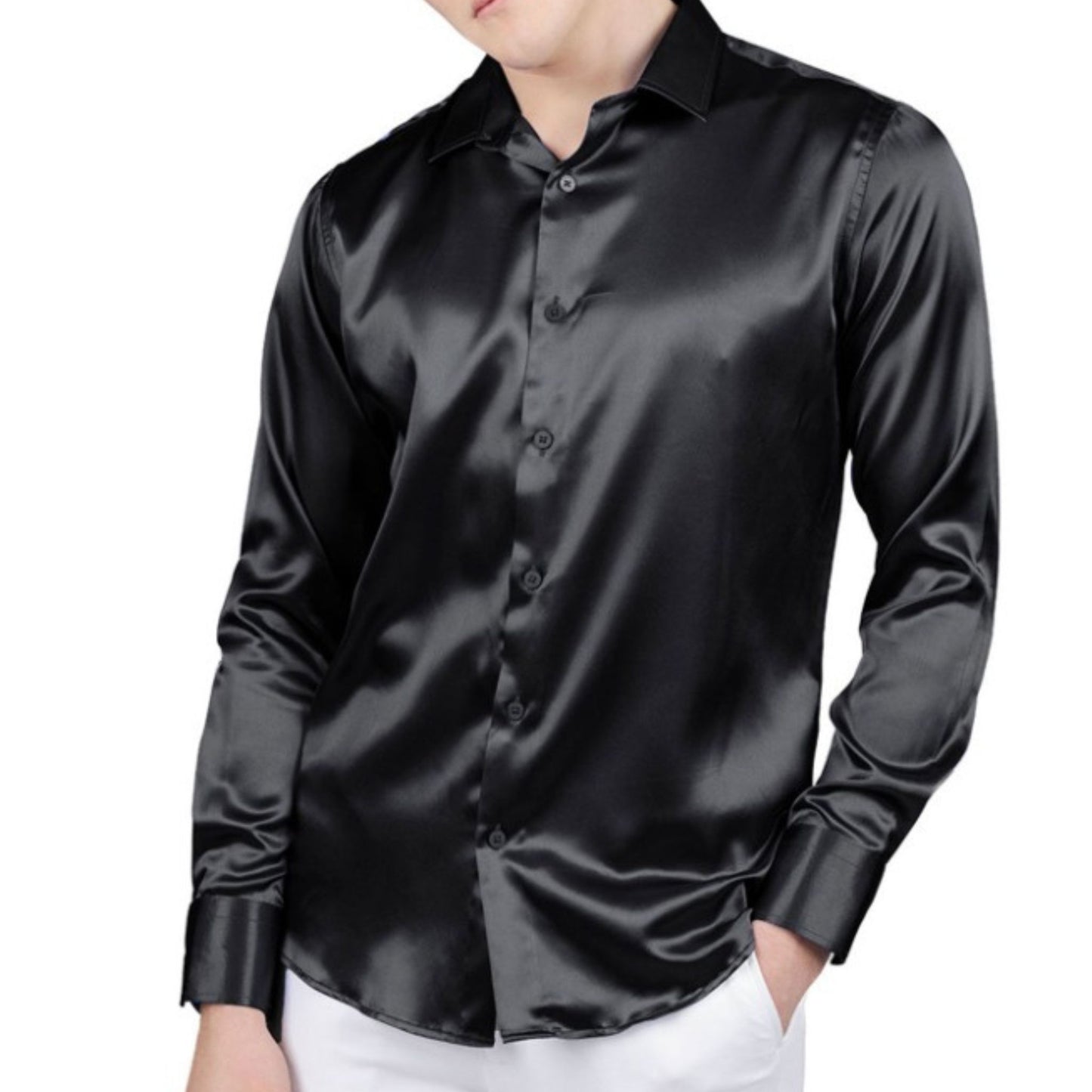 A sophisticated man donning the Black Shiny Shirt by KCT Menswear, exemplifying its sleek design and glossy fabric, ideal for making a statement at formal gatherings.