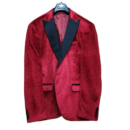 Man in KCT Menswear's red velvet sparkle blazer at a formal event