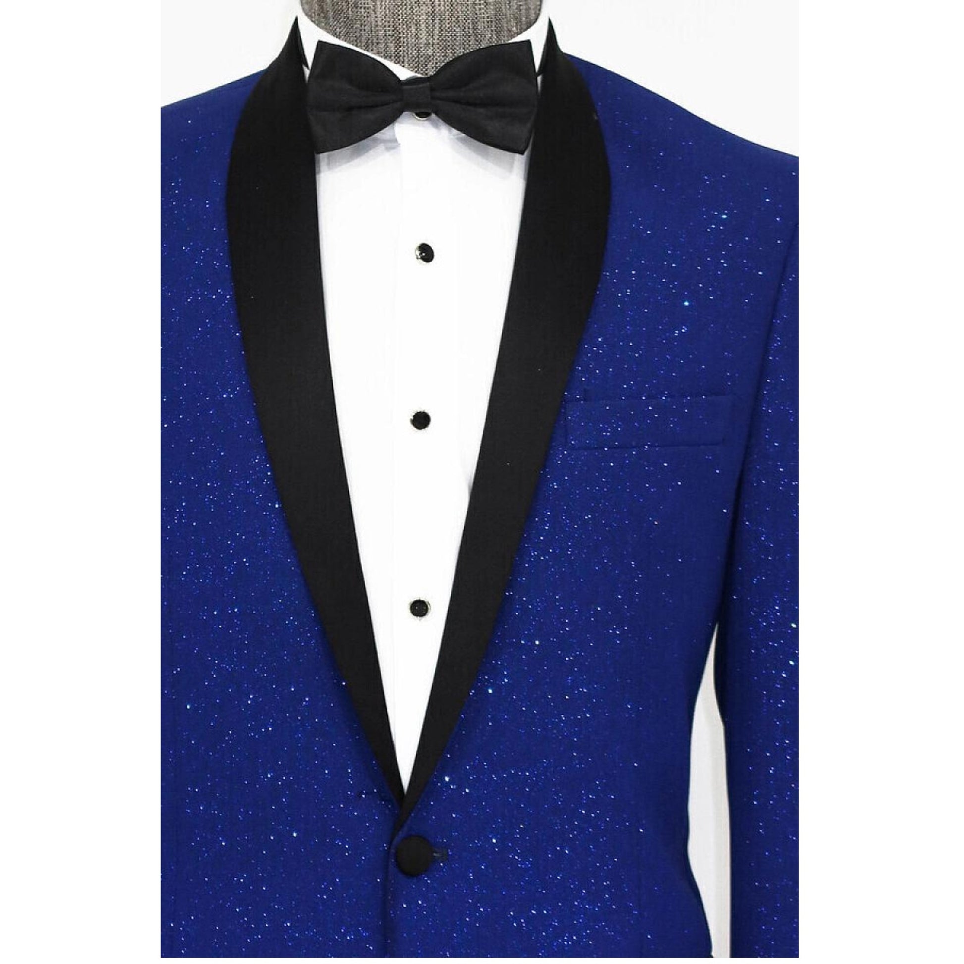 Man in KCT Menswear's royal blue sparkle tuxedo jacket exuding elegance at formal events.