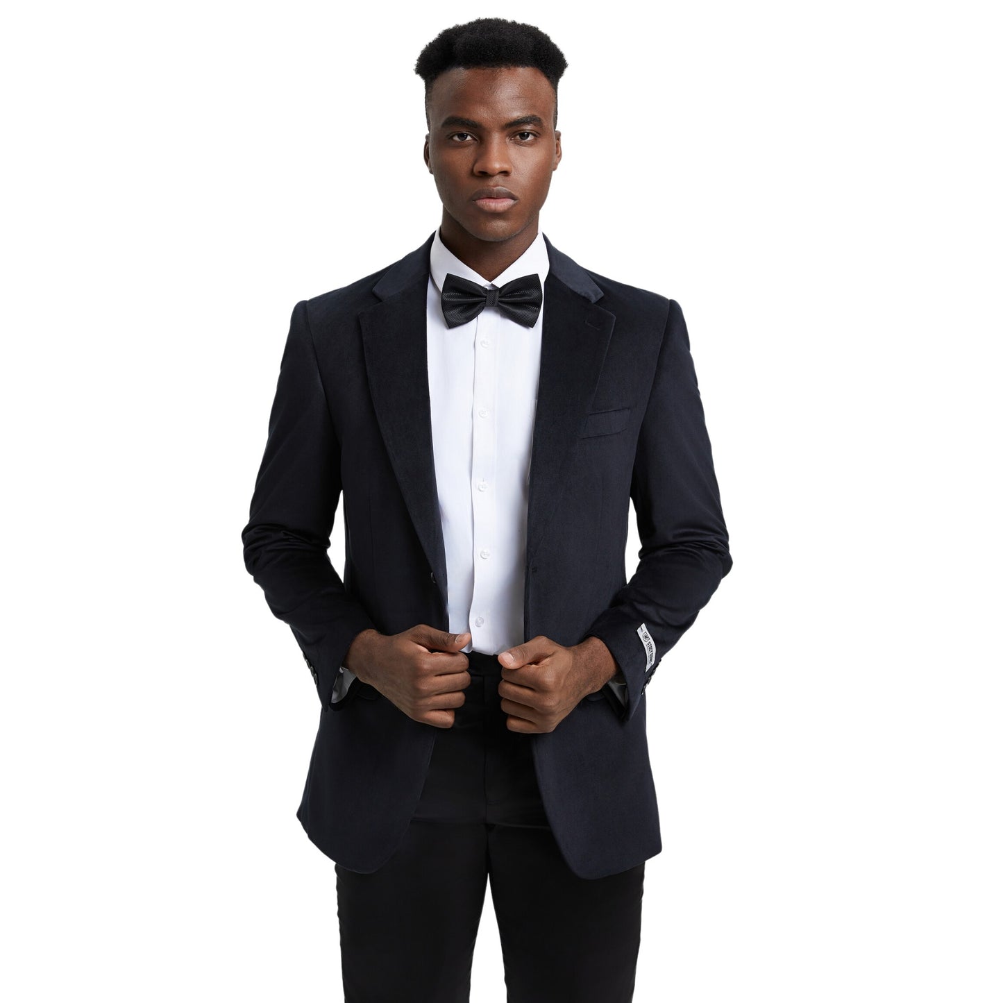 Elegant man in a classic black velvet blazer for formal events.