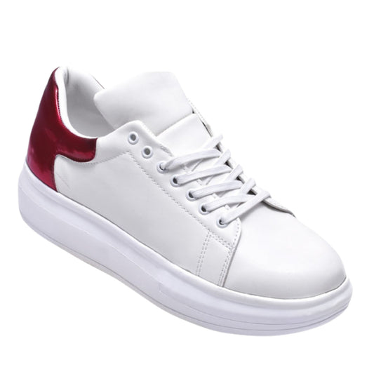 KCT Menswear's white leather sneakers with a prominent red heel, perfect for diverse occasions.