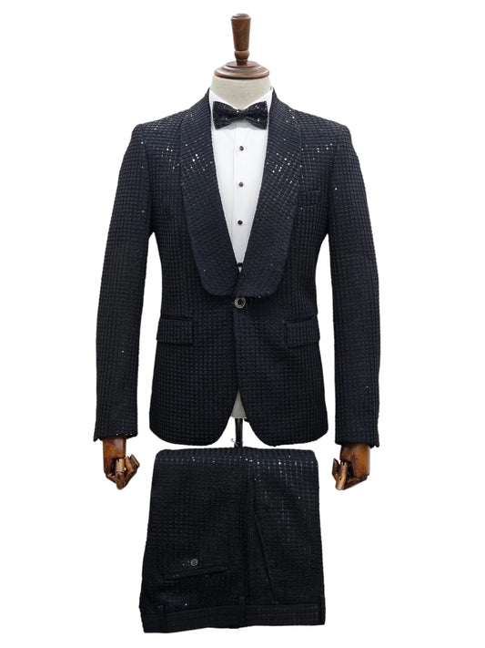 Mannequin dressed in KCT Menswear's sparkling black sequin tuxedo suit for prom and wedding events.