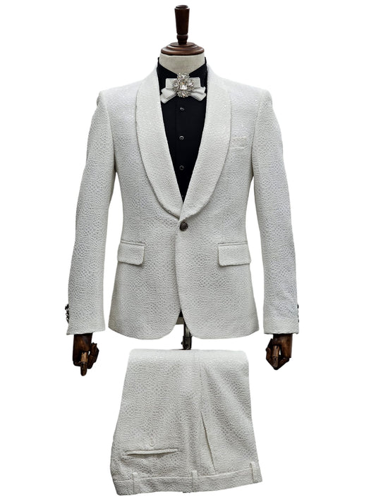 KCT Menswear's white textured tuxedo suit with an intricate pattern, perfect for high-class events.