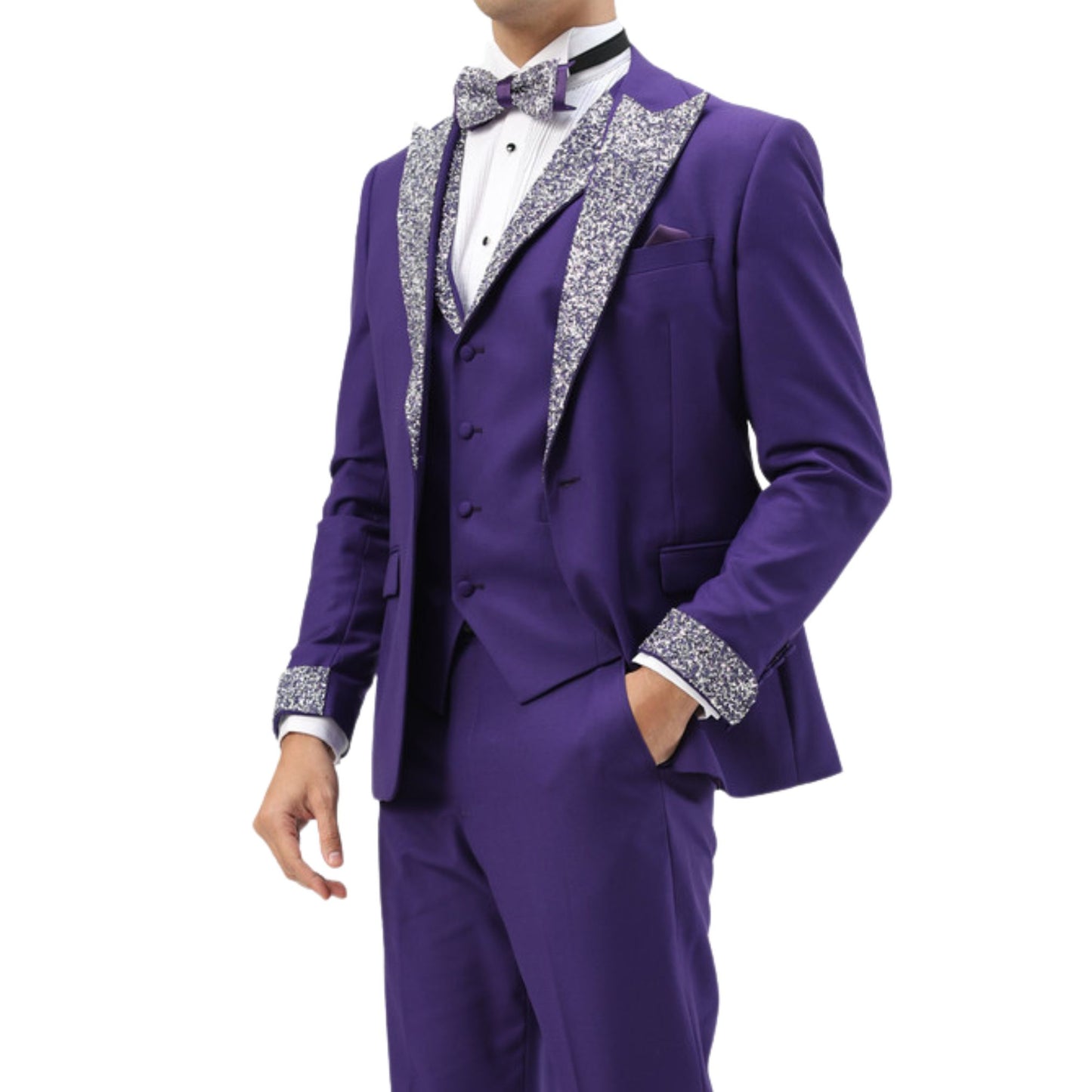 Men's royal purple sequin lapel three-piece tuxedo with matching vest and bowtie, featuring glittering sequin accents on the lapel and cuffs.