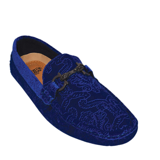 Elegant man wearing KCT Menswear's Royal Blue Velvet Paisley With Buckle Loafer, showcasing a fashionable and unique footwear option for any stylish ensemble