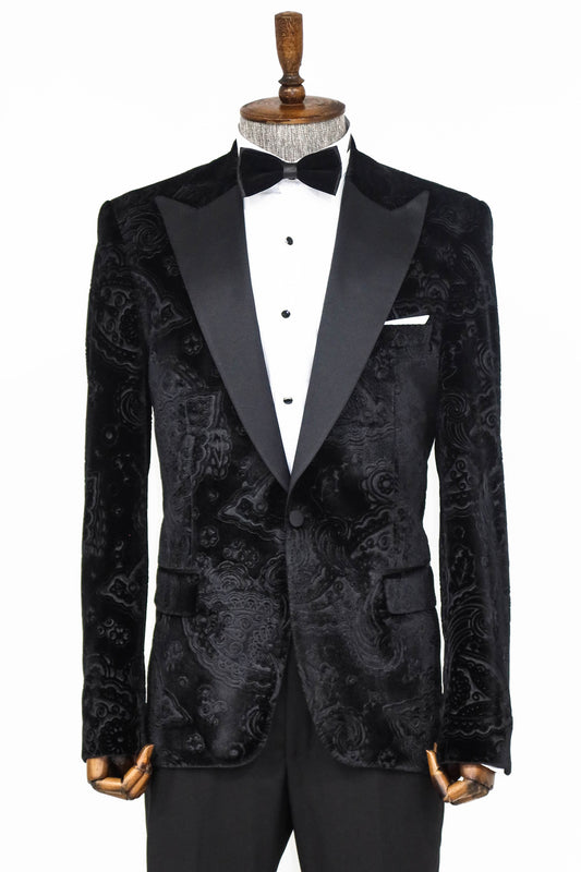 Man wearing a stylish Black Velvet Paisley Engraved Prom Blazer by KCT Menswear, showcasing elegance and sophistication in formal wear.