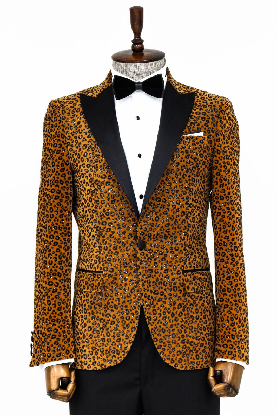 Man wearing a stylish Brown Cheetah Paisley Engraved Prom Blazer by KCT Menswear, showcasing elegance and sophistication in formal wear.