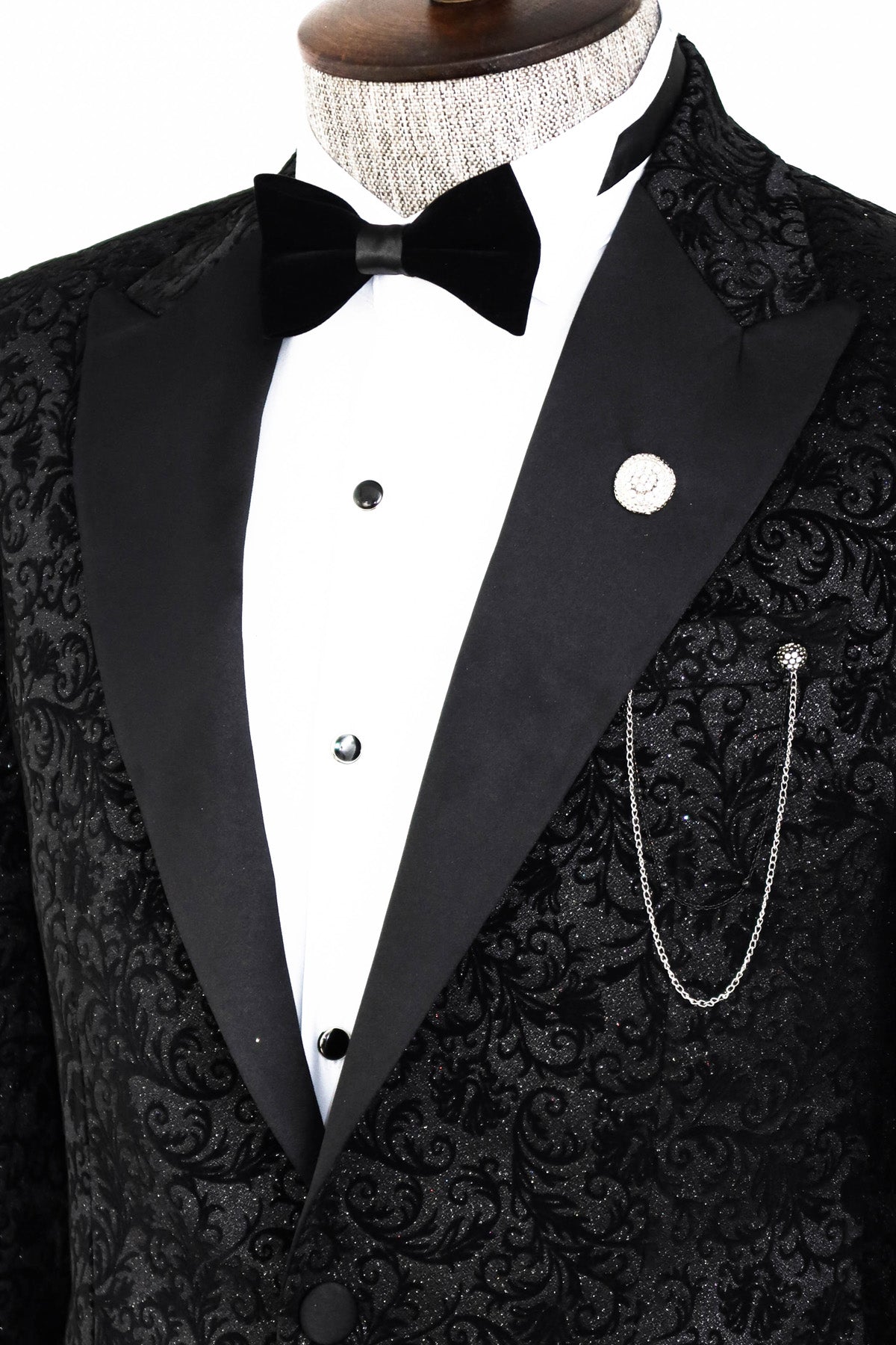 KCT Menswear Floral Sparkle Black Prom Blazer on hanger with floral sparkle black pattern