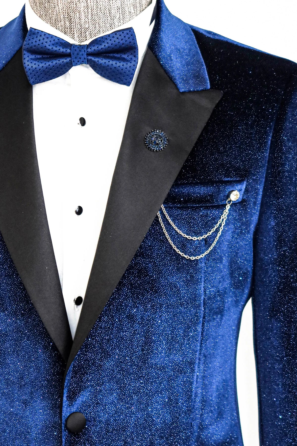 https://kctmenswear.com/cdn/shop/products/midnight-blue-slim-fit-patterned-party-blazer-prom-blazer-wessi-201568-51-B_jpg_1445x.webp?v=1681421603